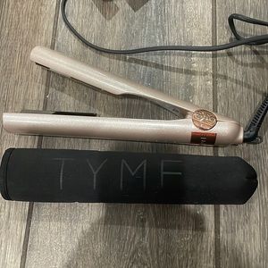 New tyme iron. Used maybe three times. Adjustable heat